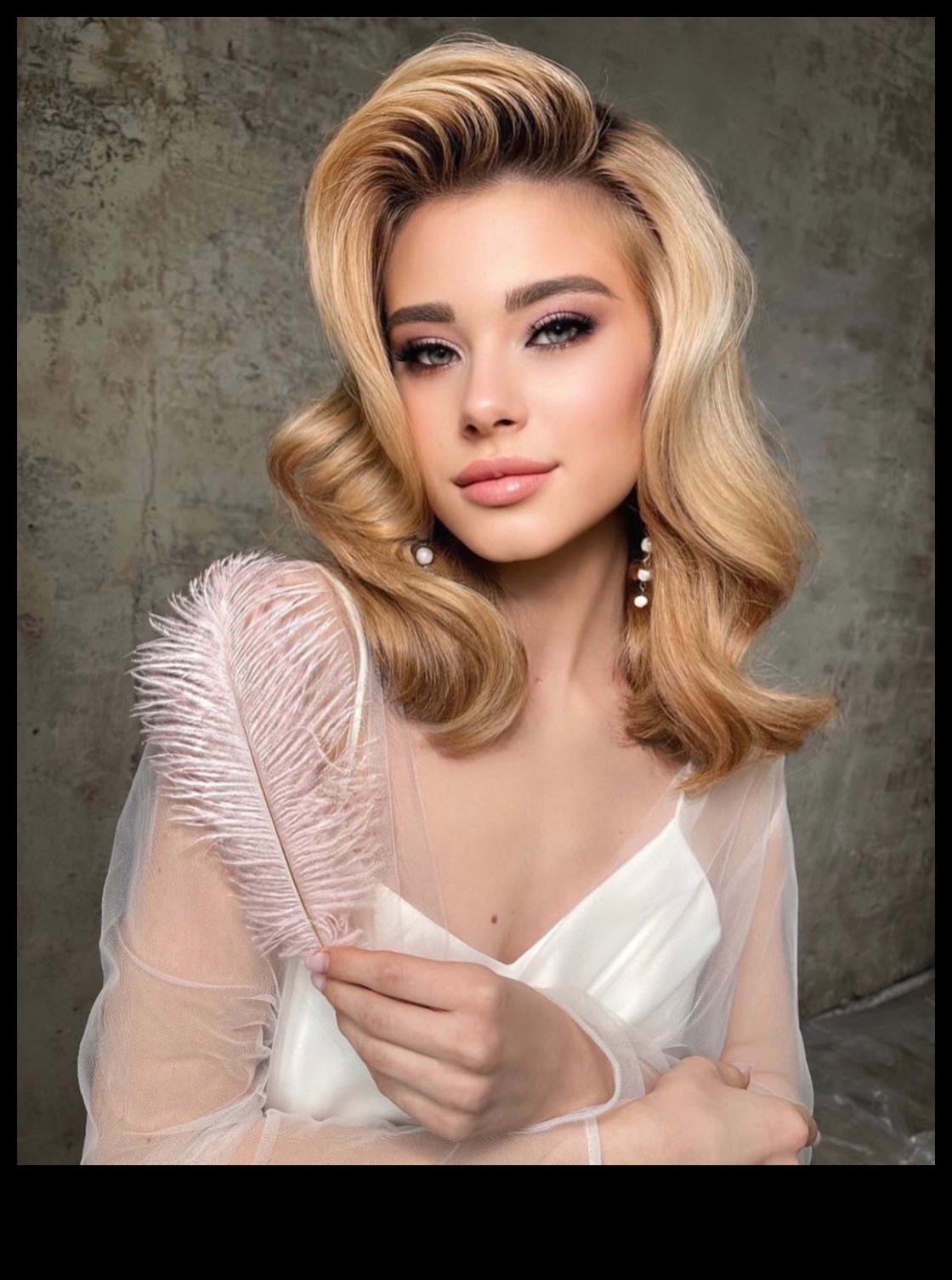 Vintage Hollywood Glam: coafuri retro blonde pentru o frumusețe atemporală